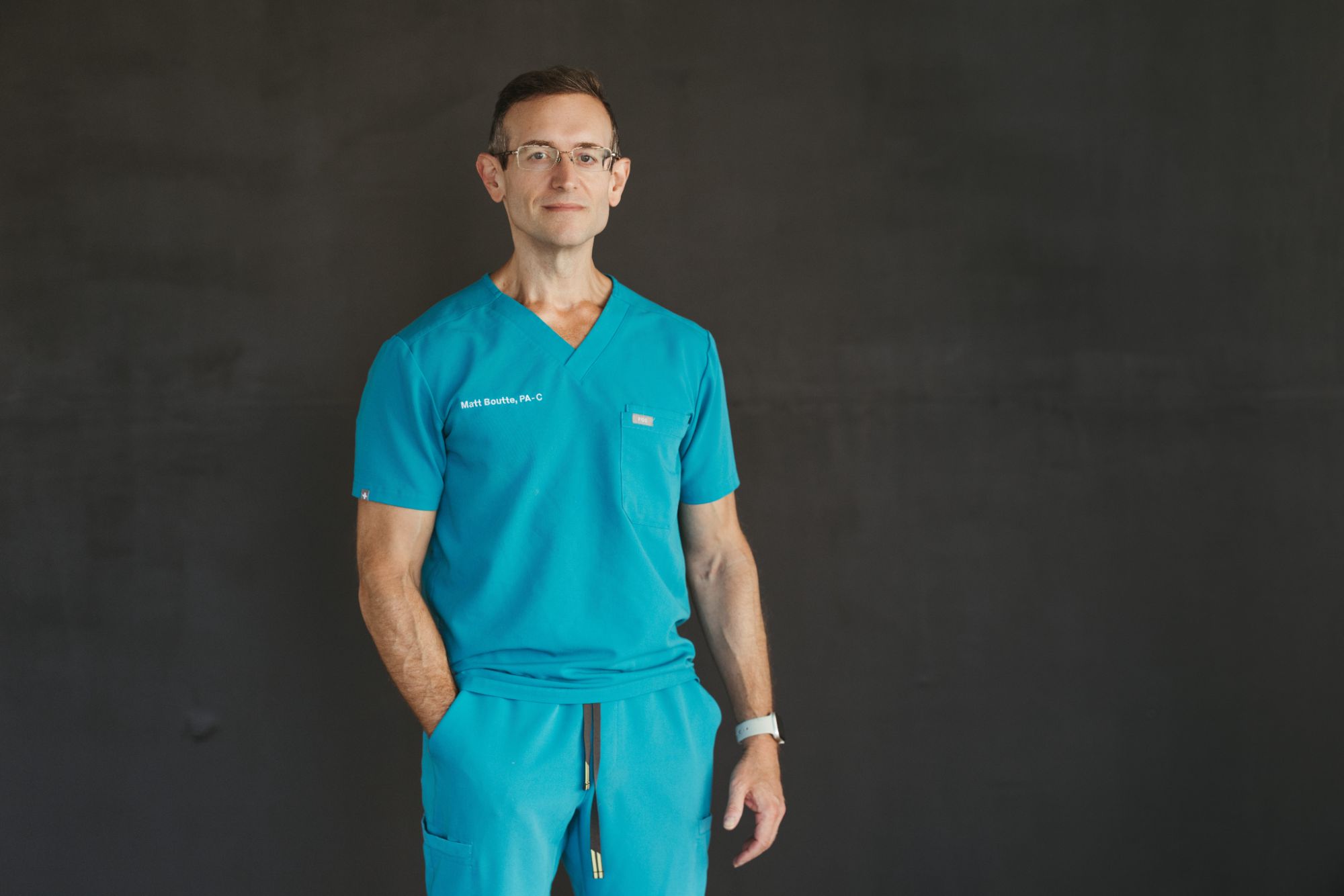 Matt Boutte, PA-C, in medical scrubs at Victory Weight Loss