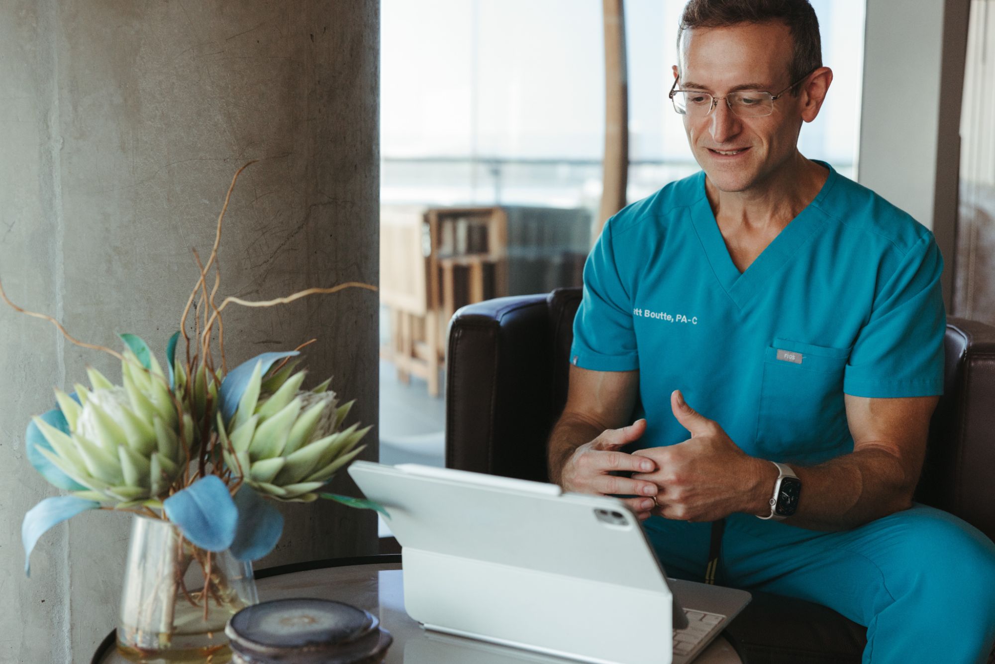 Matt Boutte meeting with a patient by video